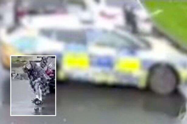 Moment man in dressing gown brandishing samurai sword chases cops captured in CCTV clip