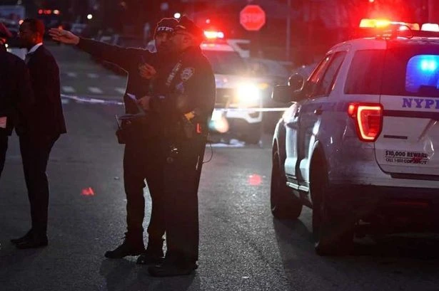 Three killed and 8 wounded in Brooklyn restaurant shooting as gunman on loose