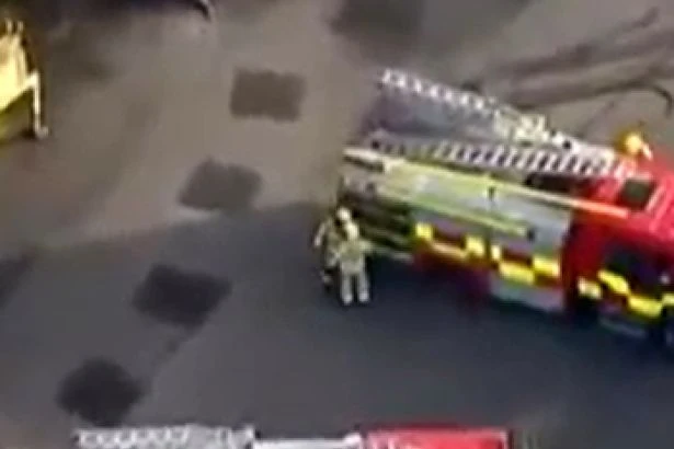 Belfast firefighter brawl as lorry blaze started by 'attempted beheading' rioters roars