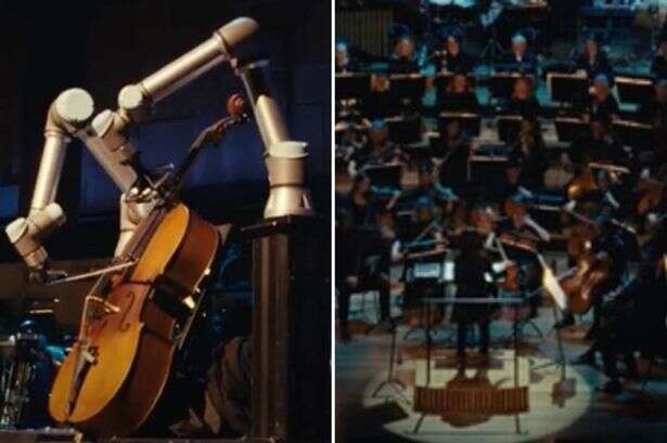 Cello-playing robot with human-like arms shocks with symphony orchestra performance