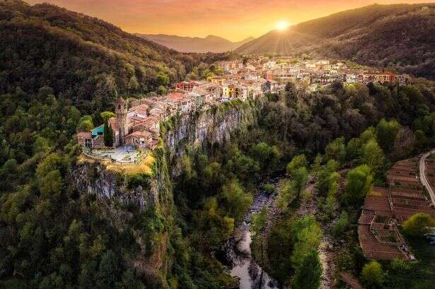 Incredible Spanish town is perched on a cliff edge just 164ft from the ground