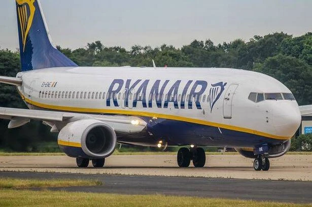 Ryanair chaos as police drag 'drunk' stag do lads off plane after 'carnage'