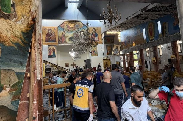 Several killed as terrorist detonates suicide bomb inside packed church during mass