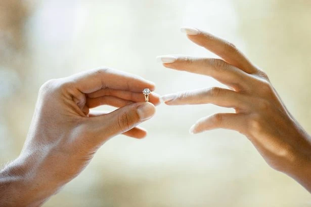 Woman touched as kind stranger records marriage proposal but makes odd blunder