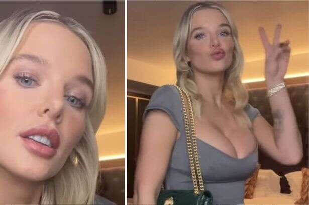 Helen Flanagan spills over plunging dress while bent over to pull up stockings