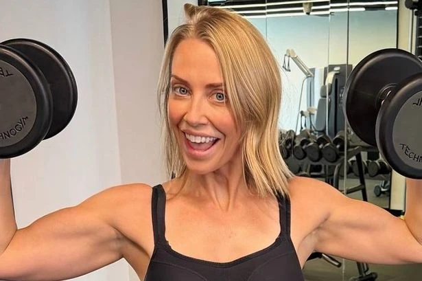 Channel 4 beauty flexes eye-popping muscles in teeny sports bra and leggings