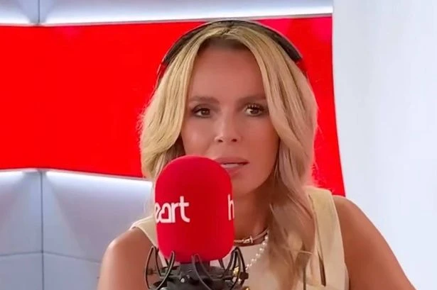 Amanda Holden shows support for John Torode after he's accused of racist remark