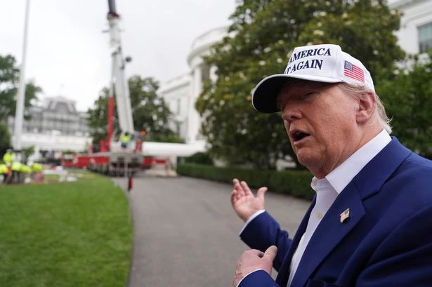 Donald Trump erects 'beautiful' massive flag poles in bizarre White House upgrade