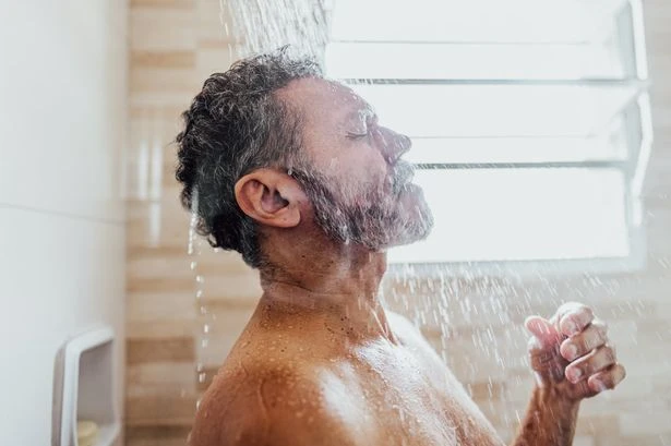 UK households lose millions by letting showers run unnecessarily, survey finds