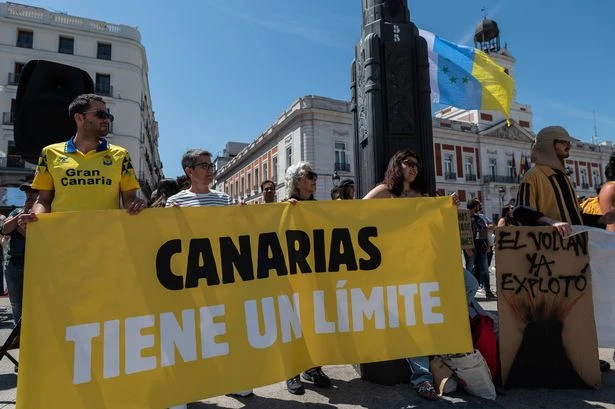 Holidaymakers left 'cowering in their rooms' as furious anti-tourism protests hit Spain