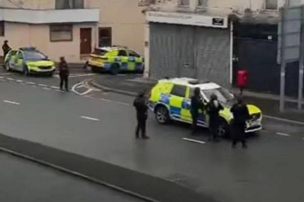 Armed police swarm UK street as 'man with sword' sparks six-hour stand-off