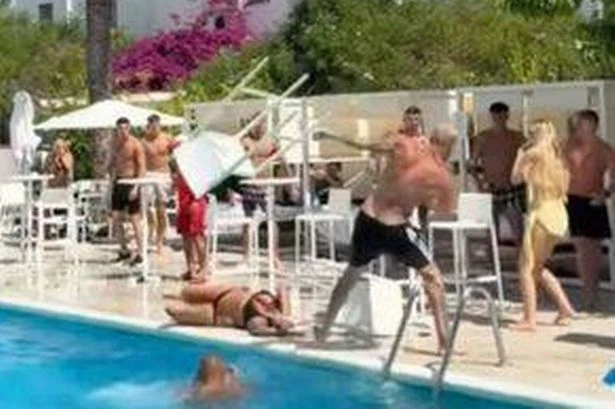 Ibiza poolside brawl as woman brutally knocked out by chair in horror hotel footage