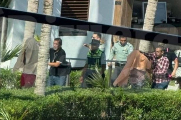 TUI family hide under sunbeds as gunfight breaks out at luxury holiday resort