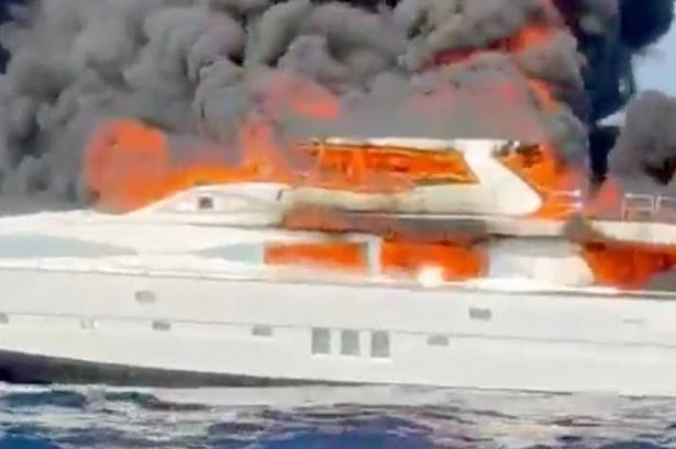 Superyacht bursts into flames and sinks off coast of holiday hotspot