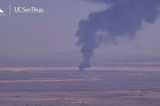 Massive smoke plume rises over Edwards Air Force Base after bomber aircraft crashes