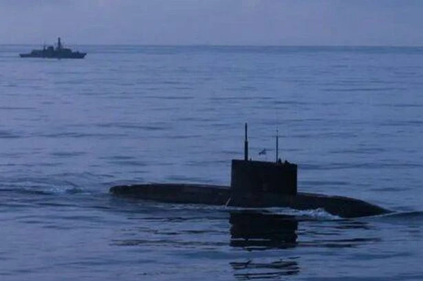 Putin's 'broken' Russian submarine mocked as it 'limps home' after Channel drama