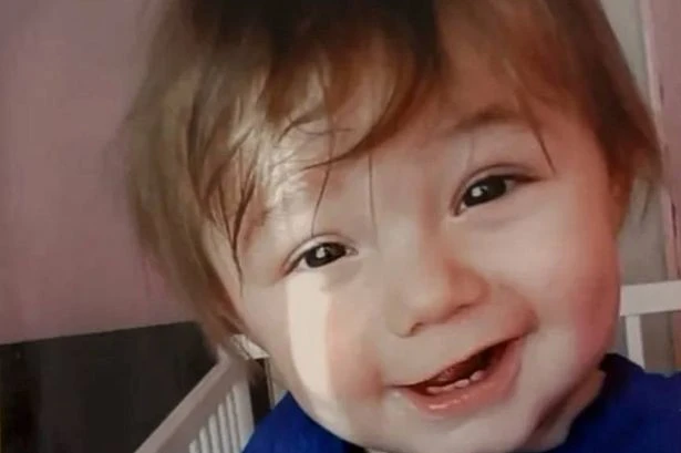 Tragic tot 'beaten to death by grandparents' while mum was upstairs on her phone
