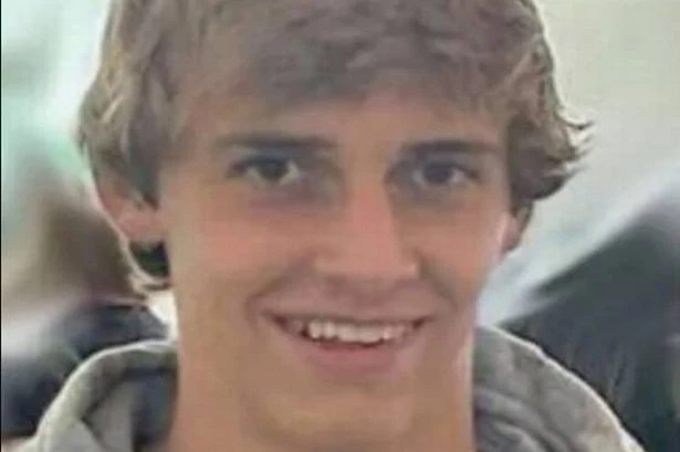 Student, 19, dies after being shot in head 'by suspect who fired gun through floor'