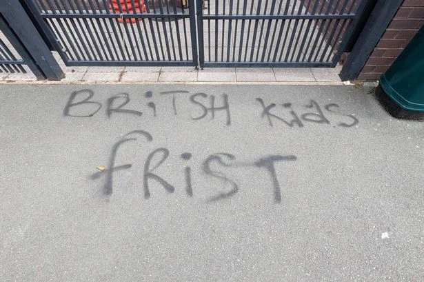 Police launch probe after badly-spelled racist graffiti appears on primary school wall