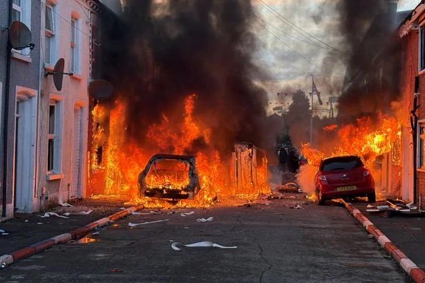 Belfast knife attack victim named locally as protesters set fire to city