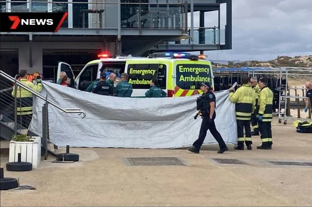 Swimmer rushed to hospital after being attacked by shark as cops say 'avoid the area'