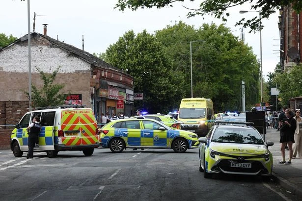Three gunshots heard as man 'chased into cafe' before armed cops swoop