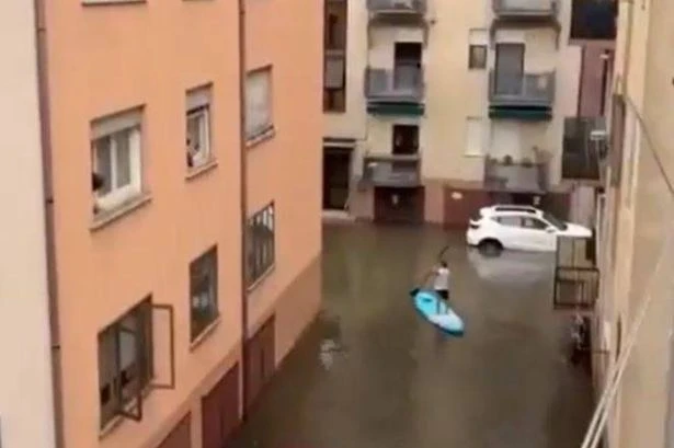 Man feeding stray dogs dies after 'water bomb' hits popular Brit holiday hotspot