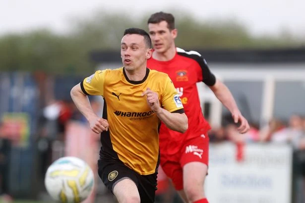 Football match abandoned after player suffers sickening collision with concrete wall