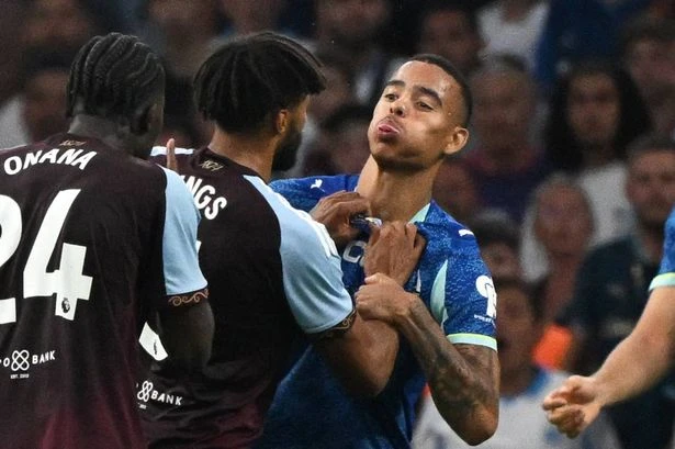Mason Greenwood reacts after shirt is ripped by Aston Villa star in furious brawl