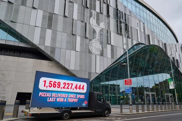 Domino's set up billboard at Spurs' ground marking time since trophy and it's huge