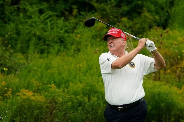Trump blasted for 'hiding on golf course' as Texas flood death toll hits 70, 11 girls missing