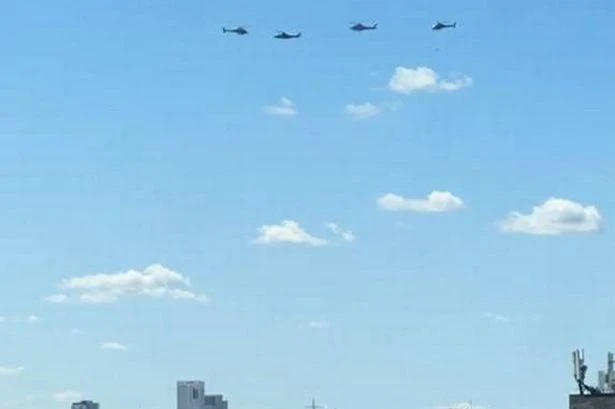 Mystery as 4 helicopters spotted circling London landmarks as thousands watch