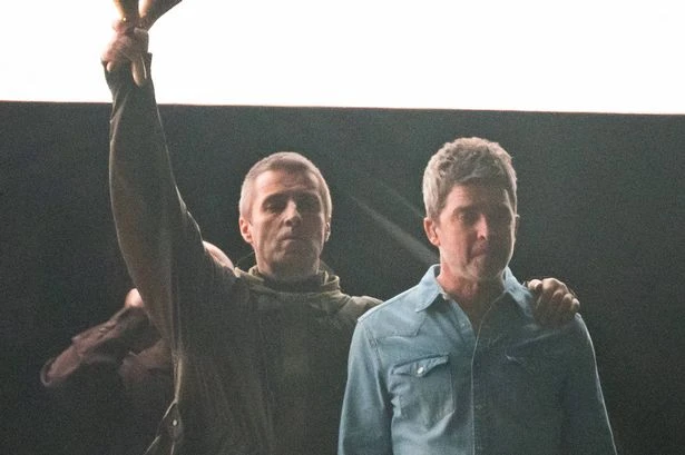 Oasis gig descends into chaos as fan rushed out on stretcher after medical emergency