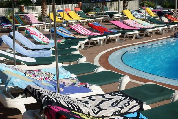 Hotel sunbed 'rules' as tourists queue for an hour to get 'prime' spot