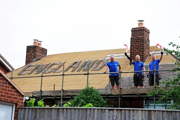 Builders spell out support for England at Euro 2020 on roof they're tiling