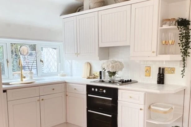Mum's transformation of tired kitchen for only £100 leaves friends speechless