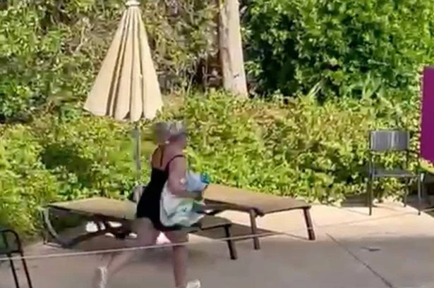 Moment UK tourists sprint for sunbeds at Spainish hotel pool