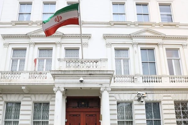Men 'attacked protester who knelt and kissed Iranian flag' outside embassy