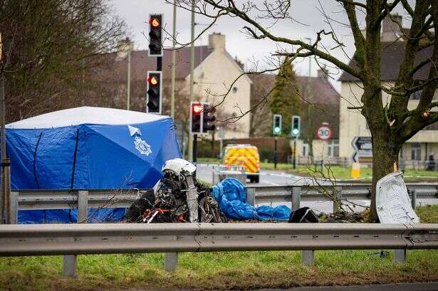 Man dies after electric Porsche crashes into tree outside UK spy base