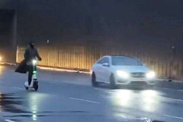 Reckless e-scooter rider risks life as they travel down Aston Expressway in 60mph Storm Darragh winds