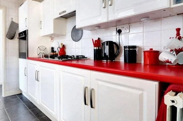 Coca-Cola themed house for sale - complete with branded fridge and fireplace