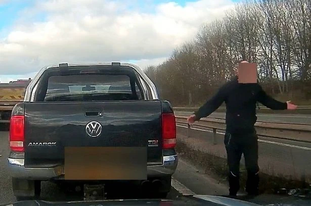 Moment raging driver slams on brakes and stops on M40 during stand-off