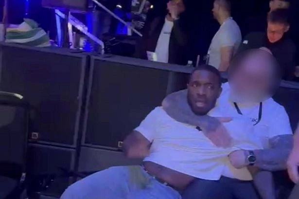 Rapper Konan held back by security during huge brawl at Midland boxing event