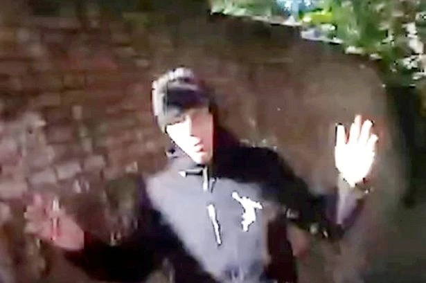 Moment robber who threatened to stab kids in park is caught by police