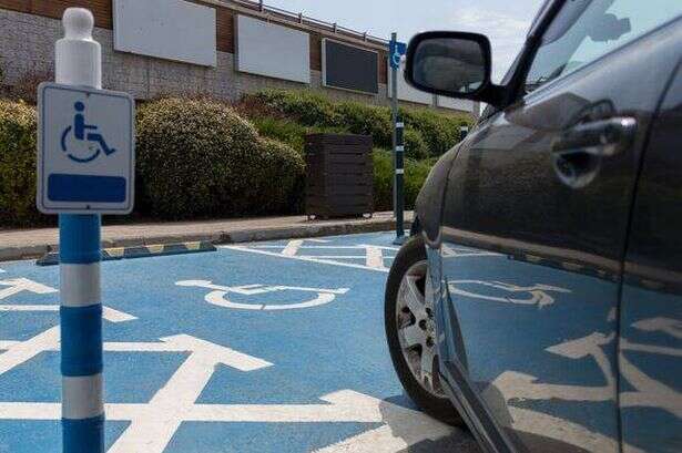 Man 'teaches police officer a lesson' after spotting him parking in disabled bay