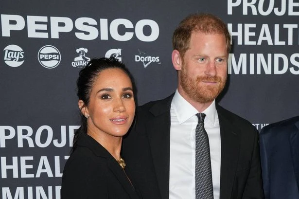 Meghan Markle and Prince Harry's awkward red carpet moment as she 'makes request'