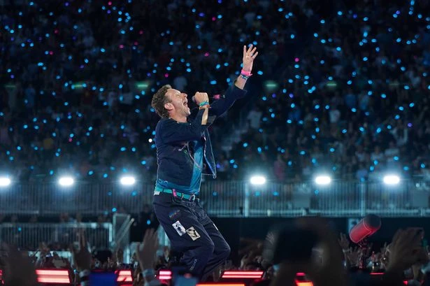 Coldplay fans hide faces as Chris Martin calls them out in 'awkward' kiss cam moment