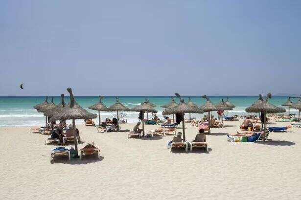 UK tourists in Spain who use parasols at beaches or pools 'warned'