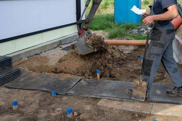 Man finds 'grave' in garden after digging up metal box big enough to fit human inside