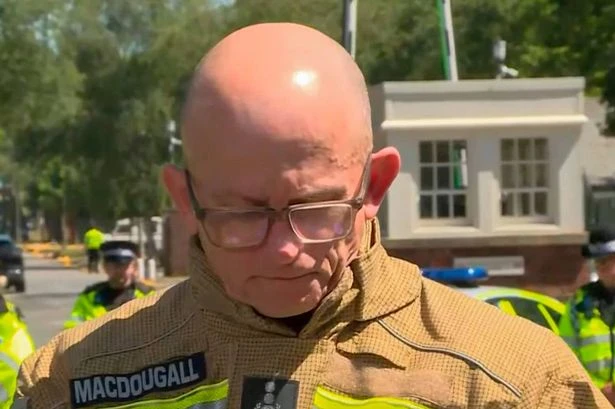 Fire chief breaks down in tears as he confirms two firefighters have died in huge blaze